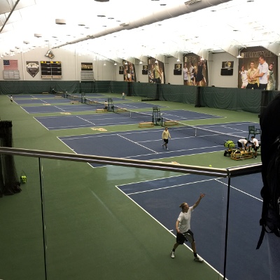 Tennis players at an indoor court